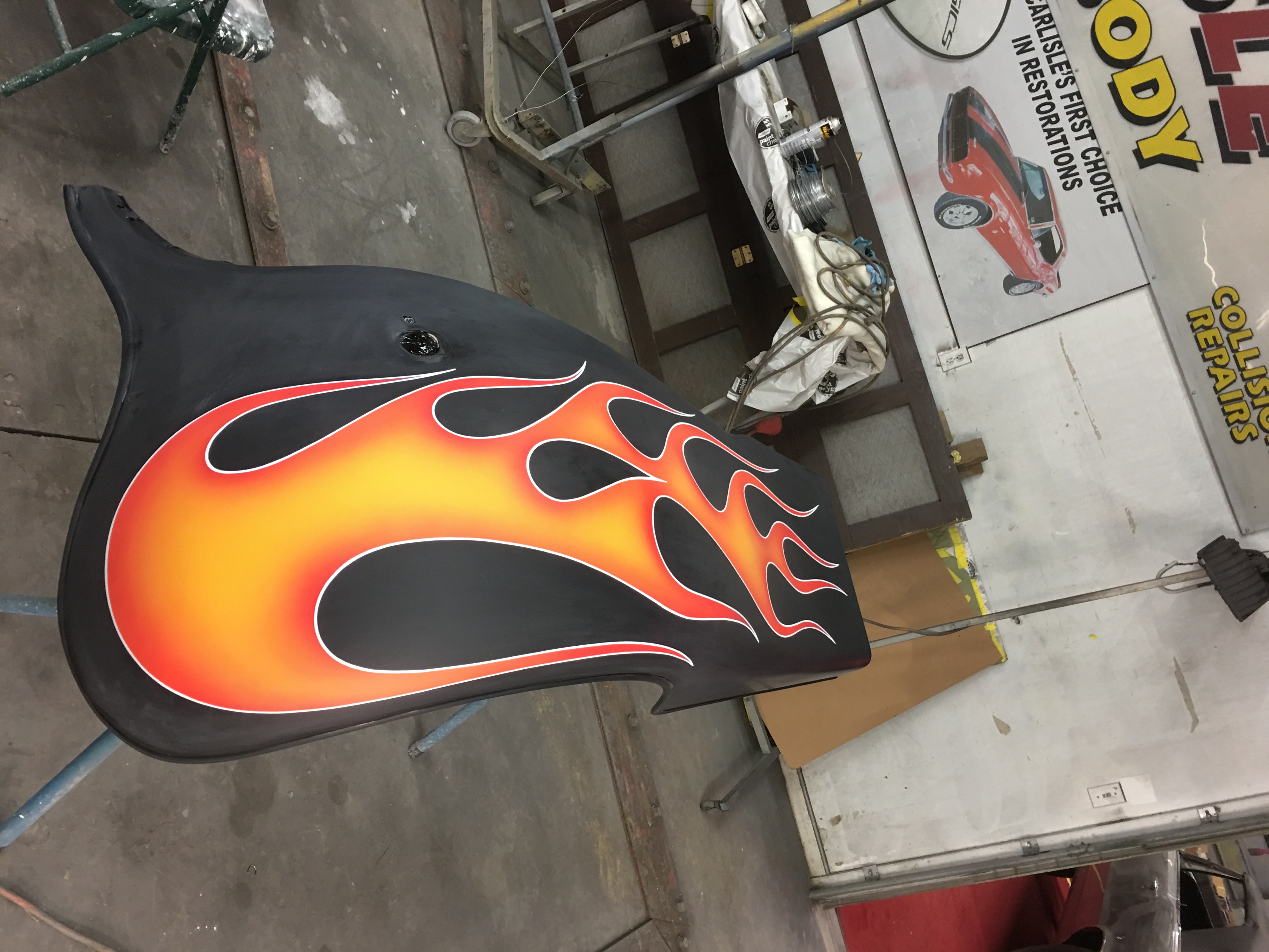 Custom airbrushed flame graphics on a motorcycle rear fender