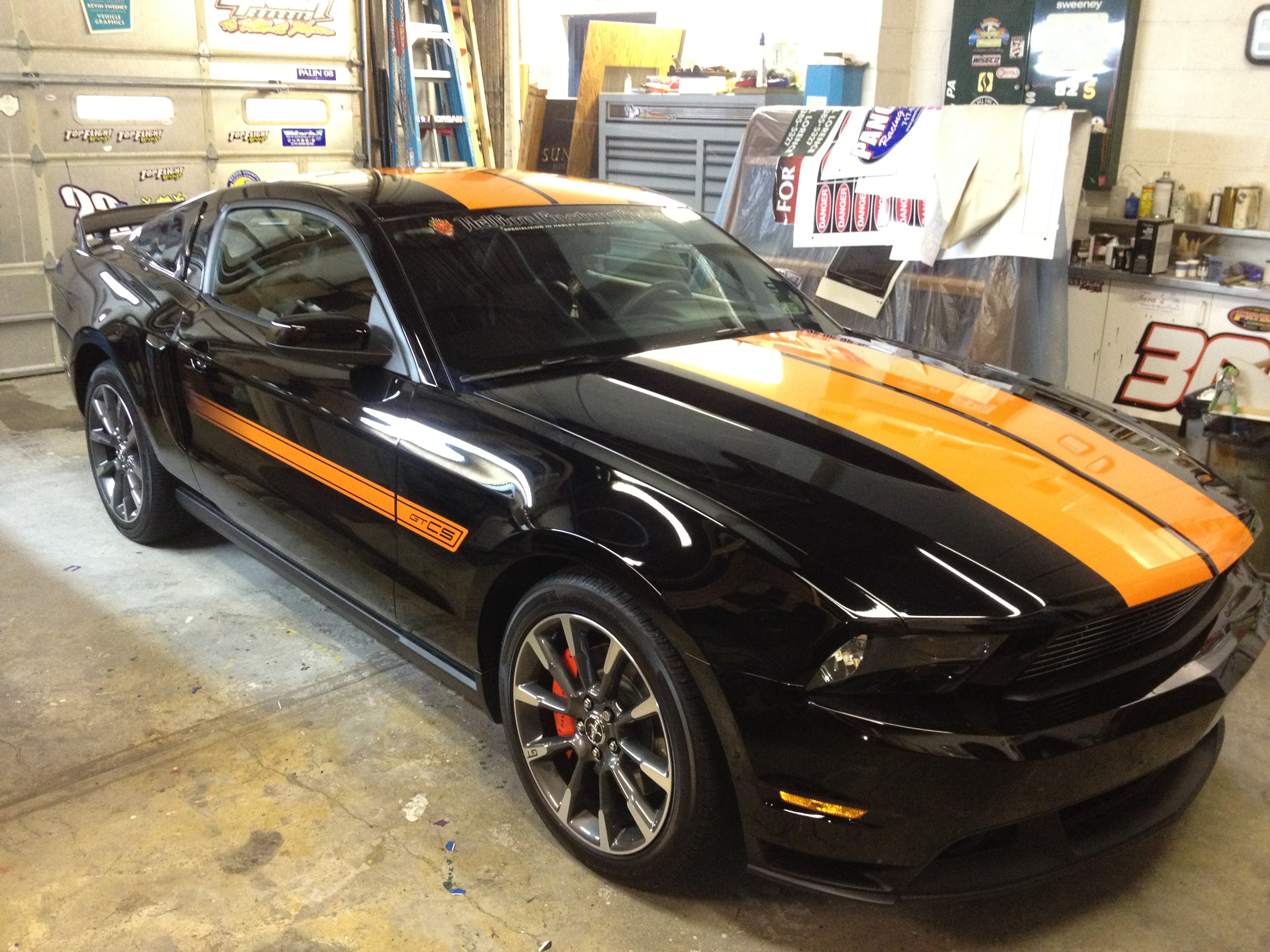 Custom striped Mustang finished in the Sweeney Signs shop