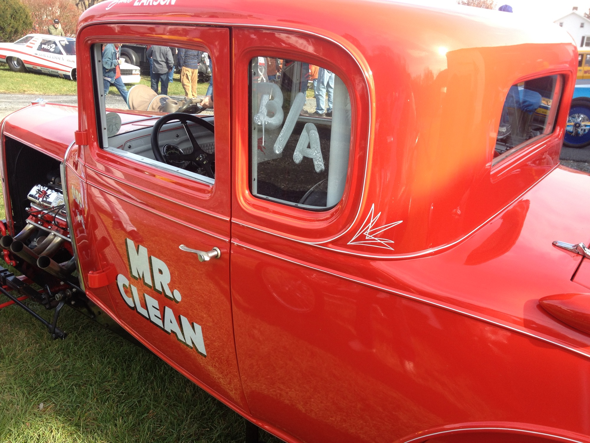 Hand-painted lettering on a classic hot rod