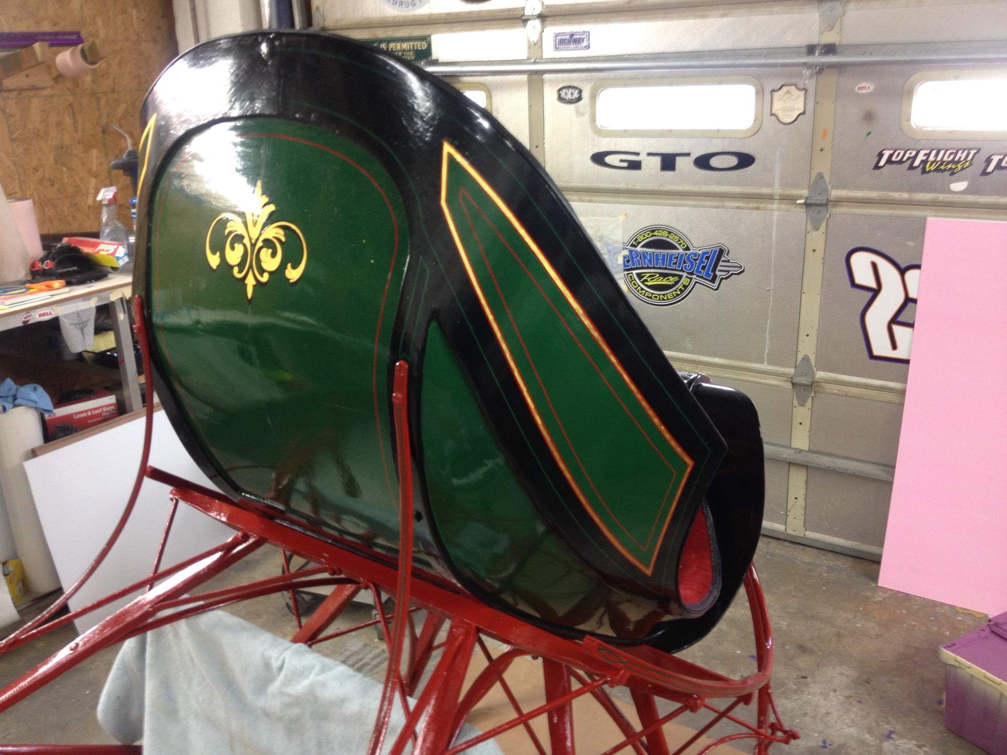 Gold pinstripe outline on a painted panel